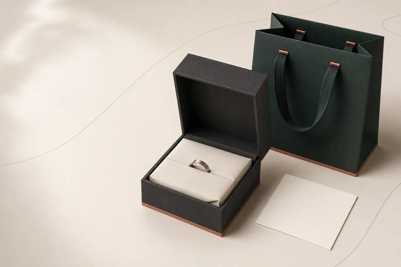 Concept rendering of a rigid jewelry box, fitted insert, paper bag and blank card.