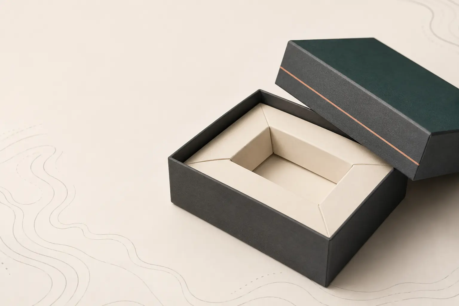 Concept rendering of an open two-piece rigid box with a fitted paper insert.